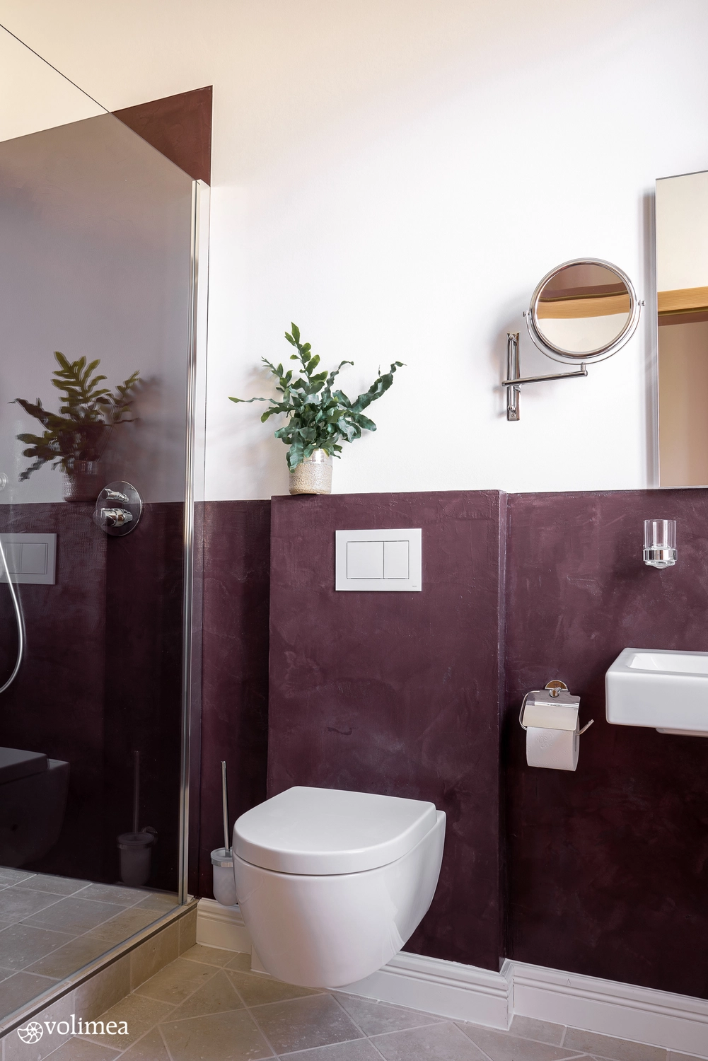 ni´s Farbenspiel Malermeister - Malermeister - Innenraum eines stilvollen Wohnzimmers mit Bildern